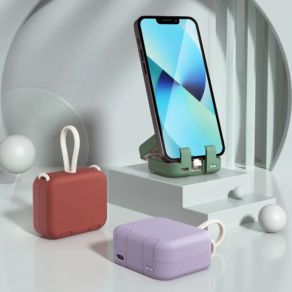 Mini Power Bank and Phone Holder - portable charging solution